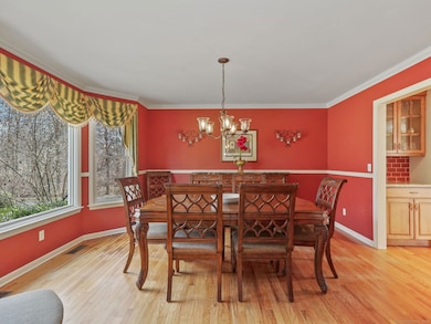 Formal Dining Room with beautiful bow window.
