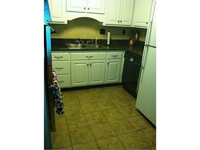 Kitchen. Ceramic tile floor, granite countertops