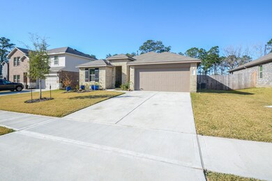 Double wide driveway and doors away from a quiet cul-de-sac