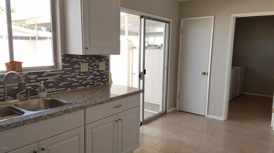 Kitchen entrance to the bakyard