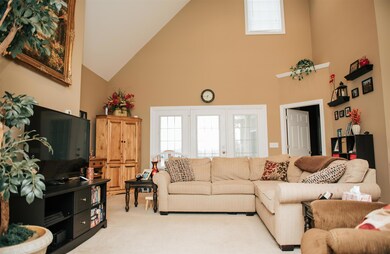 Living Room with cathedral ceilings