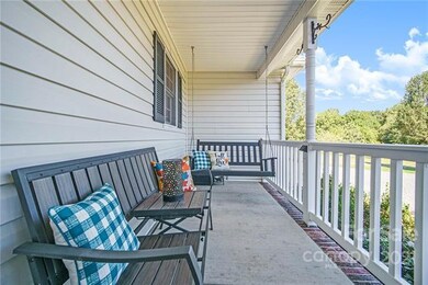 Enjoy a cup of coffee on the front porch to start 