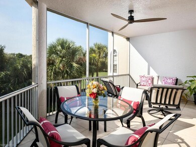 Sunroom featuring a ceiling fan and outdoor dining area