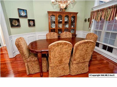 Formal dining room with large picture window