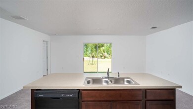 2710 NE 3rd Ave, Cape Coral, FL 33909 - photo 2