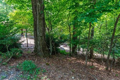 This home is located on a spacious, wooded and pri