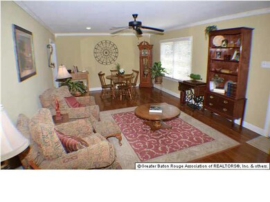 Spacious family room with original hardwood floors