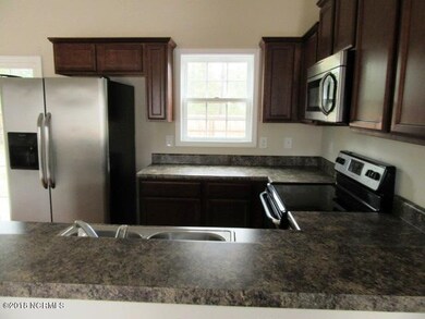 111 Lilac Kitchen View 2