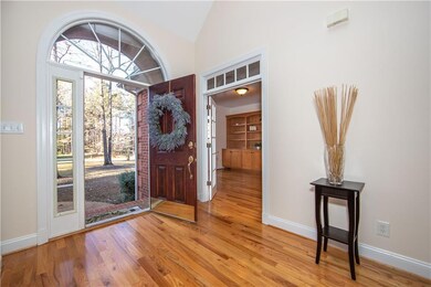 Gleaming hardwoods greet your guests as they enter