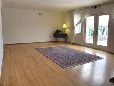 Living room with French doors to back yard