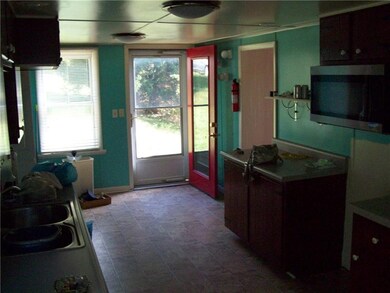 SIDE ENTRANCE INTO KITCHEN AREA