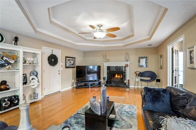 Living room with hardwood / wood-style floors, cro