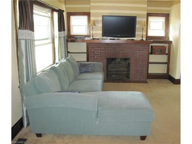 Large living room with focal fireplace