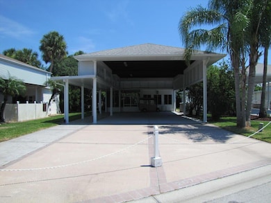 207 Coach Club Dr, Titusville, FL 32780 - photo 2