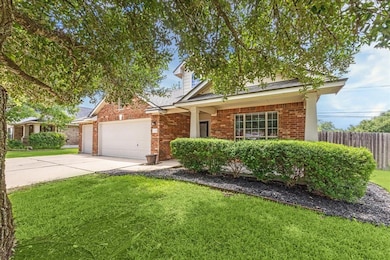 View of front of property with concrete driveway,