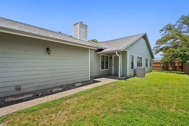 Rear view of property with central AC and a chimn