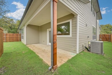 Covered back patio is great for enjoying your outd