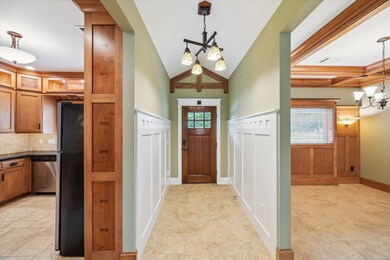 THIS STUNNING FRONT DOOR, CUSTOM STAINED IN RICH W
