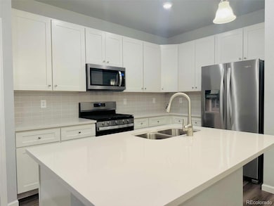 1889 S Poplar Ct, Denver, CO 80224 - photo 2