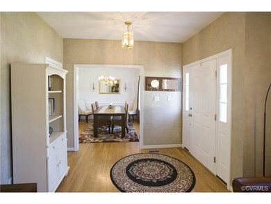 Bright foyer featuring two sidelights at front doo