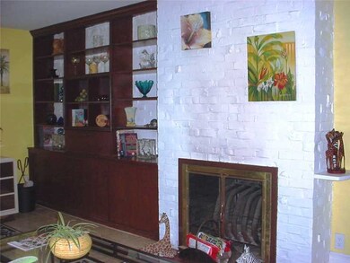 Other. Built-ins and fireplace in Sunroom