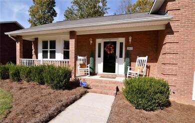 The pretty covered porch is a great place to relax and enjoy the fresh air.
