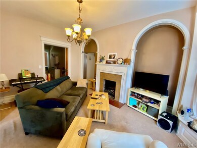 1st Floor Apartment:  Decorative fireplace, arched