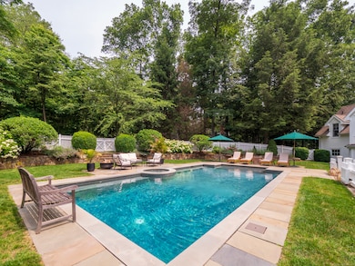 Heated salt water pool with spa