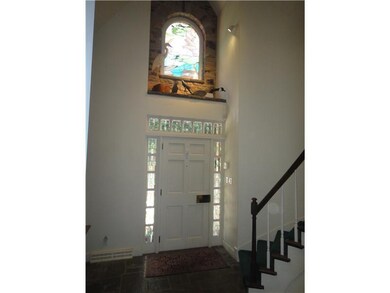 Entry/Foyer. Front entry with custom stained glass