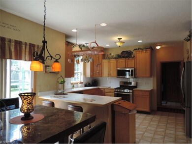 Another picture of this spacious kitchen with eati
