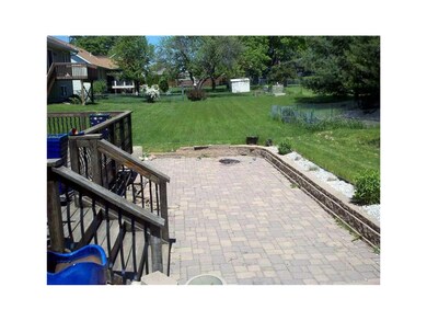 Deck. Brick patio w built in fire pit.