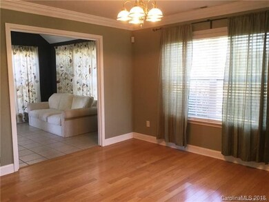 Dining area and shot of sunroom