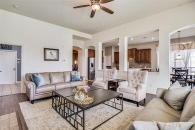 Living room that is open to the kitchen.