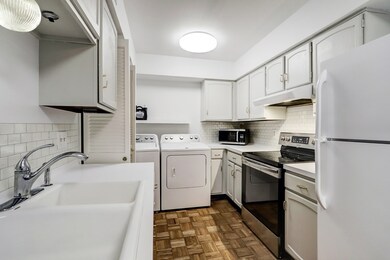 Kitchen view 2, the sale includes full sized washe