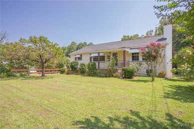 View of front of property with a front yard