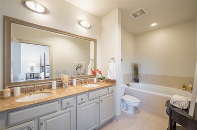 Dual vanities in the primary, perfect for the morn