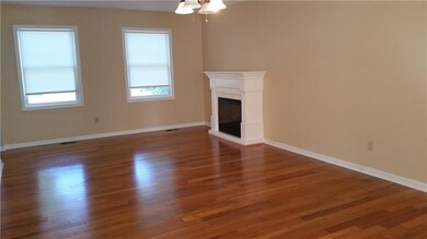 Beautiful Wood flooring and Fireplace makes the Li