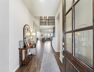 Through the foyer is the incredible open living space. Boasting high ceilings, stunning fireplace, an magnificent finishes throughout!