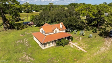 Aerial view of property and surrounding area