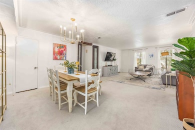 Generous dining room comfortably accommodates extra seating or an extension table.