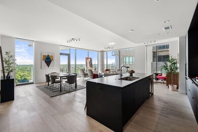 Kitchen featuring a sink, modern cabinets, a weal