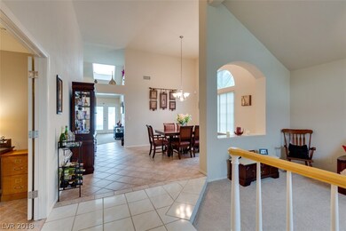 Entry into front hall with Den to the left and ste