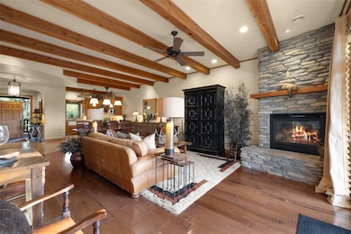 Living Area with Gas Fireplace, View from Primary Bdrm