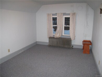 2nd floor bedroom 12x10 overlooking back yard.