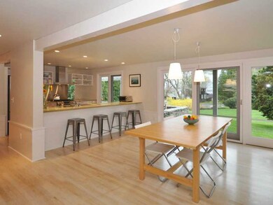 Den/Family/Great Room. Doors lead to stone terrace