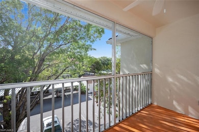 Balcony featuring ceiling fan