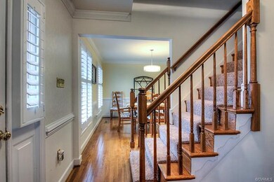 Foyer with new carpet on steps