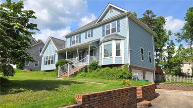 View of front of house featuring covered porch, a 