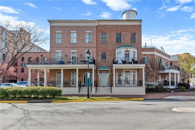View of front of property featuring a balcony