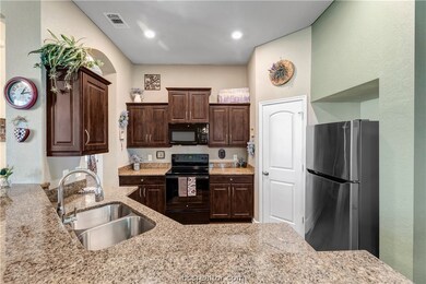 Includes a large corner pantry with built-in shelv